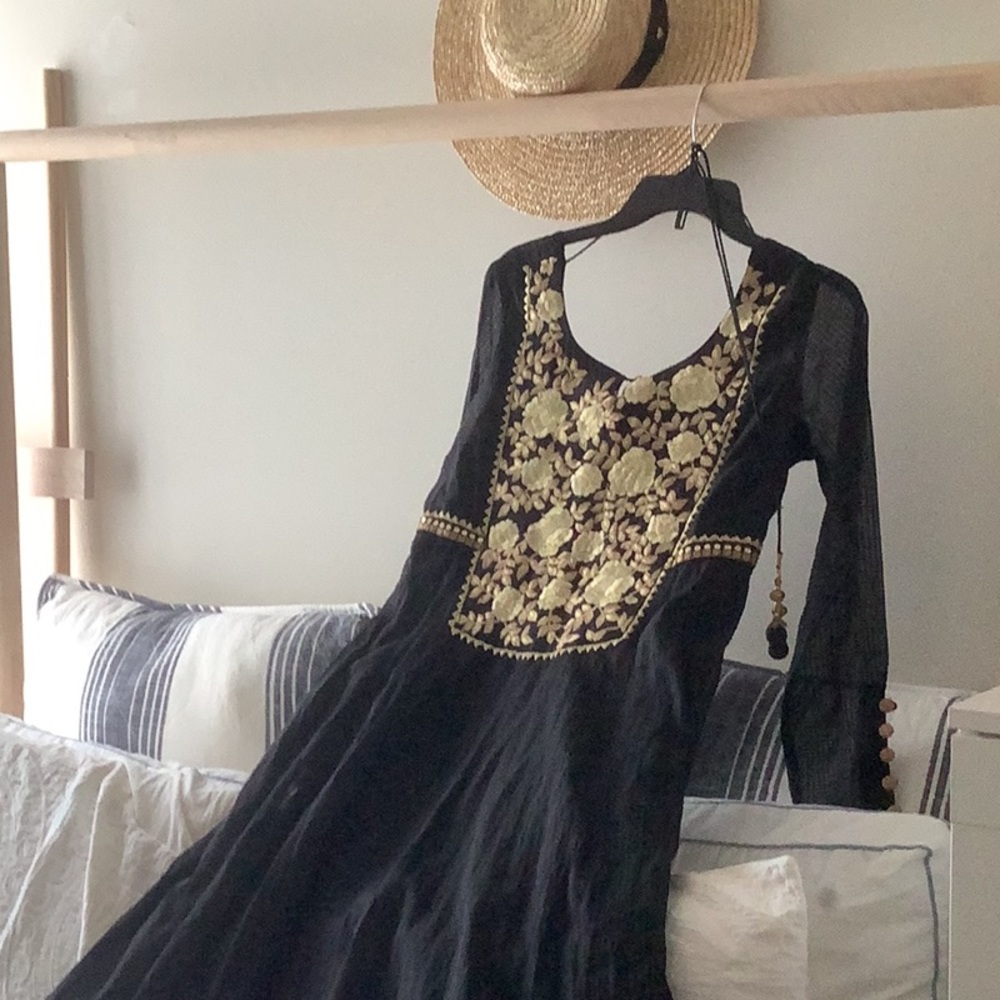 This traditional fashion has intricate embroidery and delicate stitching